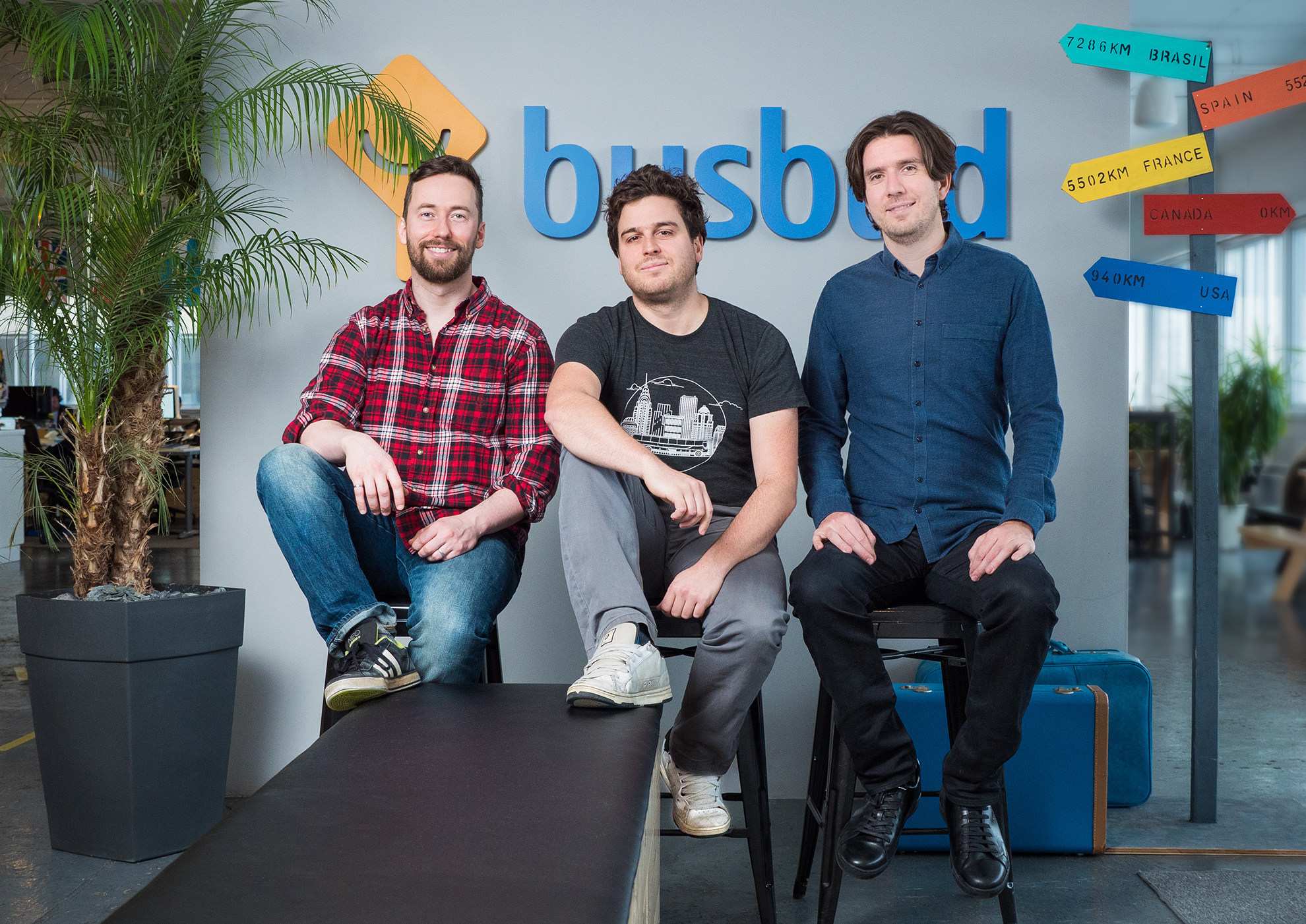 Busbud co-founders LP Maurice, Michael Gradek and Frédéric Thouin at the company's Montreal office